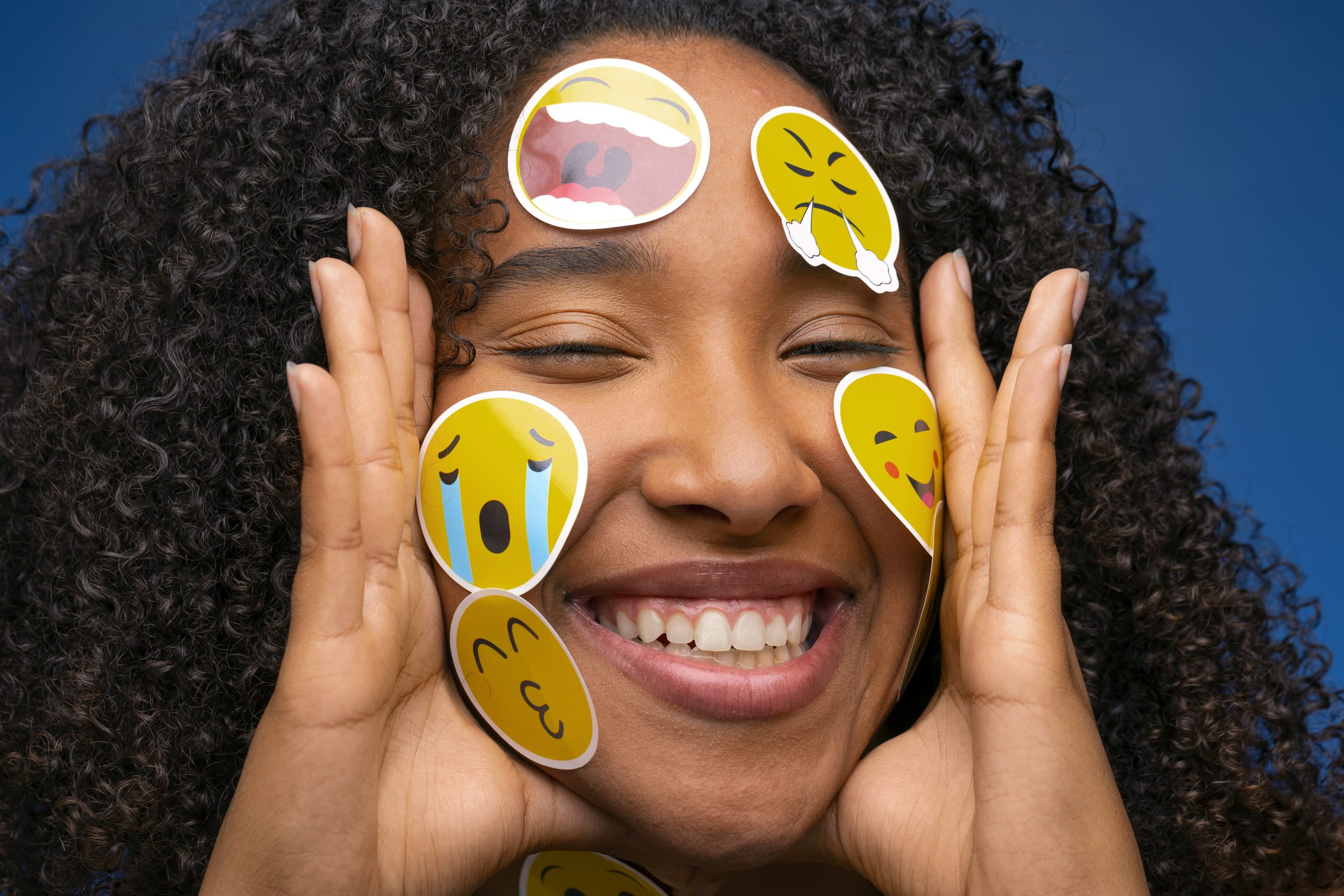 front-view-smiley-woman-with-emojis-face